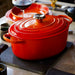 Le Creuset Enameled Cast Iron Signature 5 Quart Oval Dutch Oven in Flame