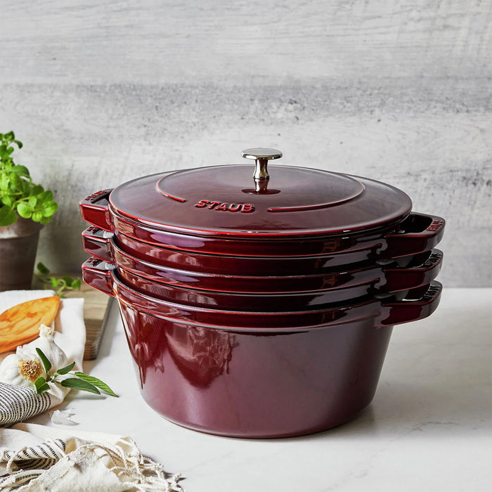 https://www.lascosascooking.com/cdn/shop/products/Staub-Enameled-Cast-Iron-4-Pc-Stackable-Set-in-Grenadine__S_2_700x700.jpg?v=1644791713